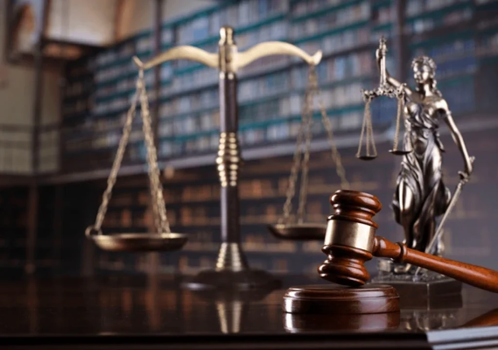 judges-gavel-on-library-background-600nw-1723862413